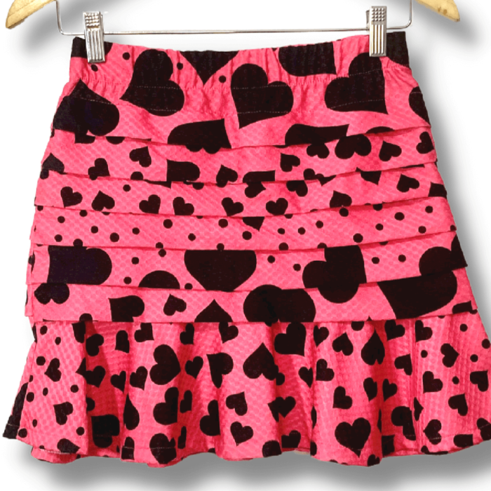 alt=”Saia-Blessed-Rosa-Pink-Preto-Estampa-Coração-P-PRM0009det1”