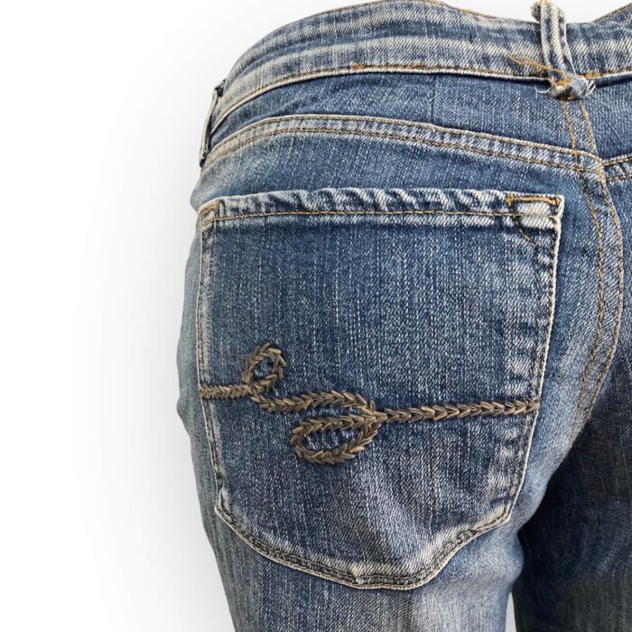 alt="Calça-Jeans-Shoulder-Zíper-Barra-46-VCC0040det1"